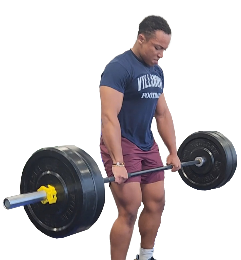 Man lifting a heavy barbell in a workout.