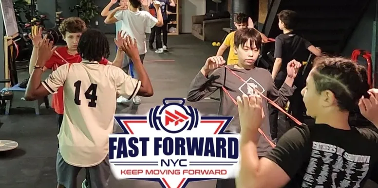 People dancing enthusiastically at Fast Forward NYC event.